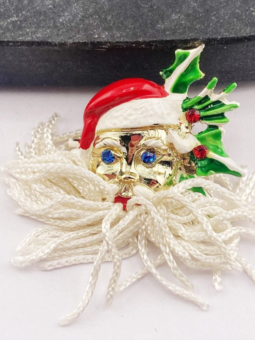 VINTAGE Gold tone metal, enamel, and rhinestone Santa Claus tassel beard brooch